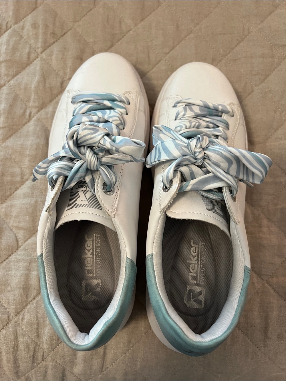 Rieker White Leather Sneakers with Light Blue Accents and Striped Ribbon Laces